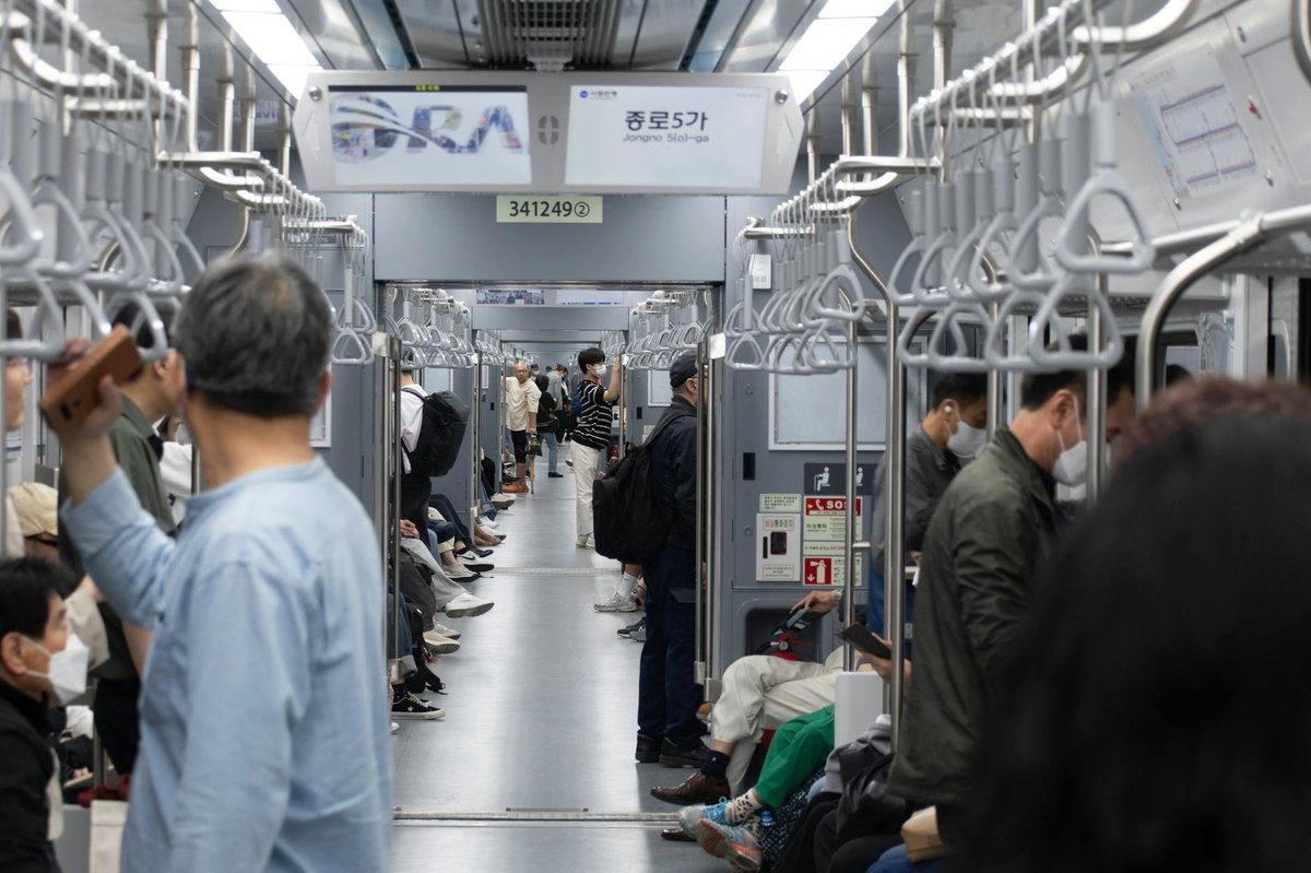 Korea Rainy Season Travel Guide June 2026 &mdash; Monsoon hits Korea around June 10-15, what to do when it rains in Seoul, best indoor activities (K-pop merch stores in Hongdae, DDP, COEX, traditional bathhouses jjimjilbang), where to buy umbrella (Daiso 5000 won, GS25, CU), subway escape routes, packing list (waterproof shoes, rain poncho), Hongdae &middot; Myeongdong &middot; Gangnam indoor course recommendations, real traveler tips - 실사용 장면